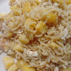 A picture of Noodles with potatoes and egg.