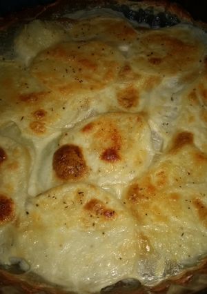 Una foto de Papas a la crema gratinadas