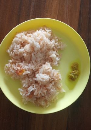 A picture of Tomato Rice in Rice Cooker.