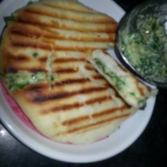 A picture of Palak cheese stuff kulcha.