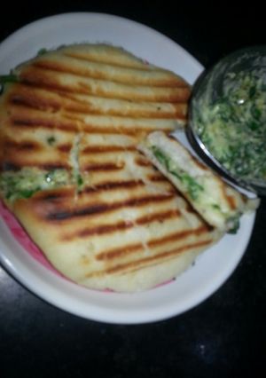 A picture of Palak cheese stuff kulcha.