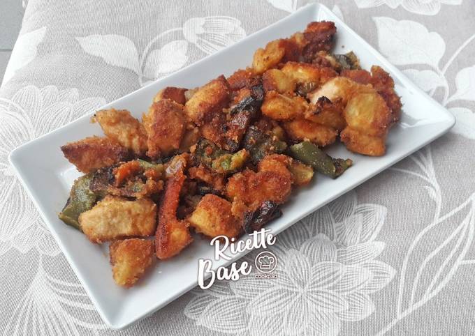 Pollo sabbioso con patate e peperoni