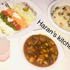 A picture of Buttered veggies rice with Italian meat ball and potato soup.