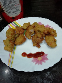 A picture of Moong Dal and onion Fritters.