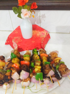A picture of Potato and chicken grill sticks.