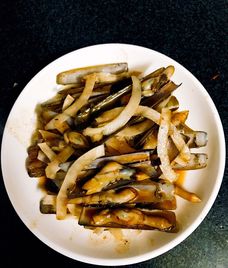 ốc móng tay xào me