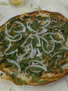 Una foto de Pizza de hummus