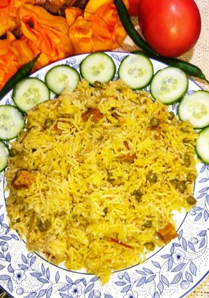 A picture of Chicken Chunks Green Peas Rice or Tahiri 😋.