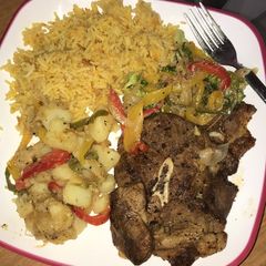 A picture of Buttered Mutton with carrot rice and hot salads...