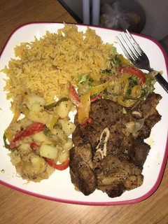 A picture of Buttered Mutton with carrot rice and hot salads...