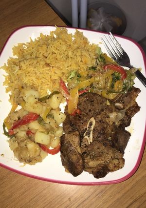 A picture of Buttered Mutton with carrot rice and hot salads...