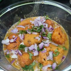 A picture of Sambar vada.