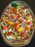 Carpaccio di orata al forno con pomodorini e capperi