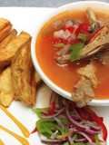 Kuku kienyeji and fried potatoes