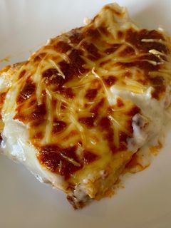 Una foto de Canelones de pollo y ternera 🫔🍗🥩🧀
