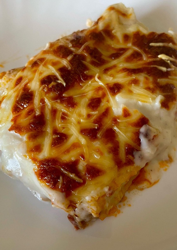 Una foto de Canelones de pollo y ternera 🫔🍗🥩🧀
