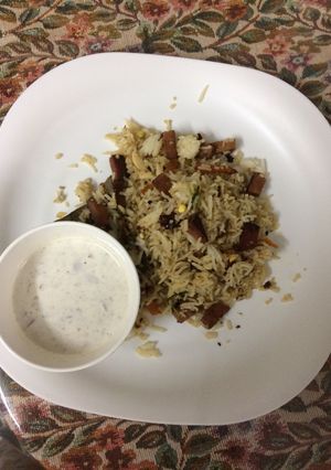 A picture of Yummy chicken salami rice.