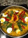 Paella con calamares y judías verdes