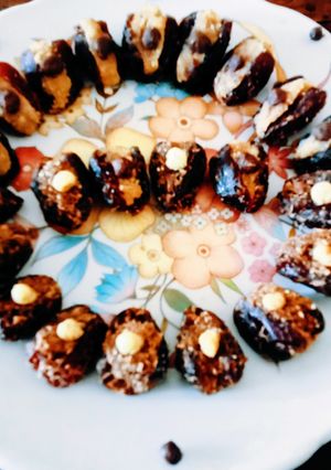 A picture of Delicious nutritious stuffed dates with mava peanut Honey dry fruits delight.