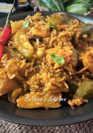 A picture of Chaal Chingri Potol (Parwal / Pointed Gourd Cooked With Prawns & Rice - Bengali style).