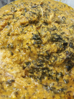 A picture of Egusi and dry bitterleaf soup.