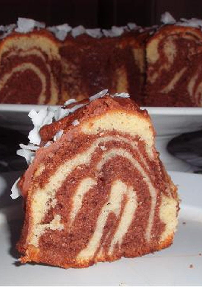 Una foto de Torta Marmolada de: chocolate, canela, vainilla y coco