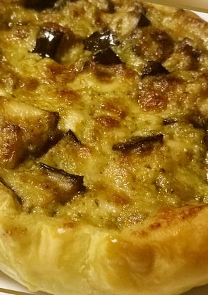 A picture of Pesto, aubergine and mozzarella pie.