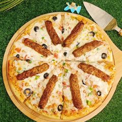 Chicken Kabab Pizza 🍕🍕 A picture of Chicken Kabab Pizza 🍕🍕.