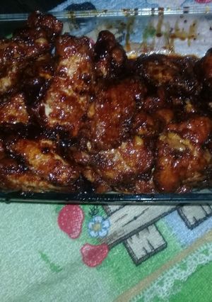 Una foto de Alitas a la salsa de miel con ajo