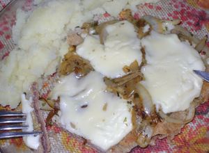 Una foto de Milanesas a la fugazzeta
