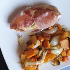 A picture of Chicken wrapped in Bacon.