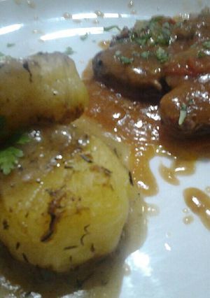 Una foto de Osobuco y papas fondant (fusion)