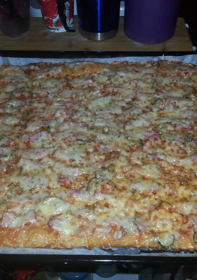 Una foto de Pizza familia