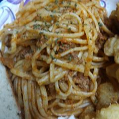 A picture of Chopped Pork in a Sauce with Linguine.