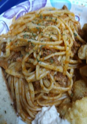 A picture of Chopped Pork in a Sauce with Linguine.