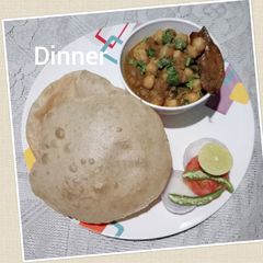 A picture of Chole bhature yummy dinner and all time favourite.