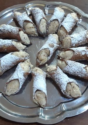 Una foto de Cannoli sicilianos