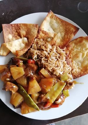Una foto de Cerdo agridulce con arroz chino