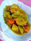 Pollo a la jardinera con tronchos de brócoli, en salsa de curry