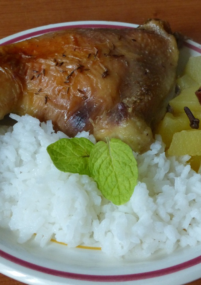 Una foto de Muslos de pollo asado