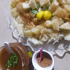 A picture of Sweet potato bake on tawa and imli ki chattni.