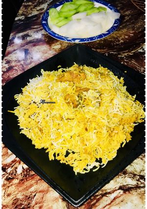 A picture of Mutton dum biryani & salad.