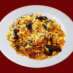 A picture of Gongura keerai chutney satham Rice with Gongura keerai Chutney).