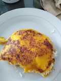 Arepa de zapallo o auyama rellena de pollo y queso blanco