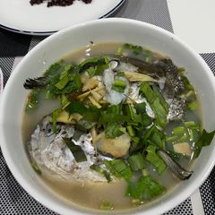 A picture of Tom Yum Head Salmon’s Clear Soup.