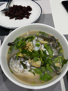 A picture of Tom Yum Head Salmon’s Clear Soup.