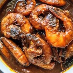 Prawns in the Tangy Tamarind Curry (Tetul diye Chingri Tok) A picture of Prawns in the Tangy Tamarind Curry (Tetul diye Chingri Tok).