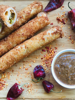 A picture of Crispy beef spring rolls.