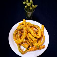 A picture of Fried onion Scapes Rings.