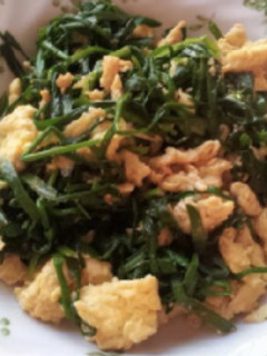 A picture of Fried Eggs and Green Chives.
